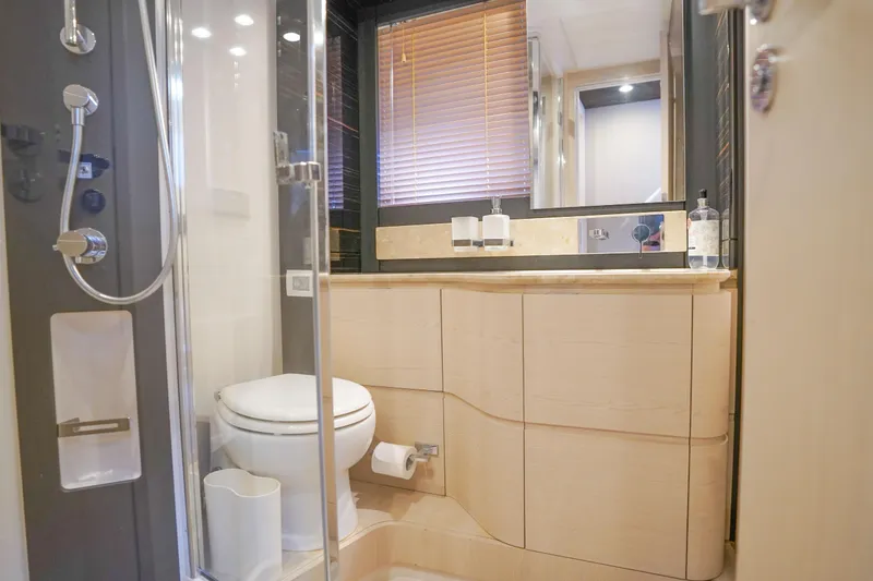 Slide: The Image of Luxurious bathroom in 2017 Azimut 66 Flybridge yacht with modern fixtures and elegant design. - 43