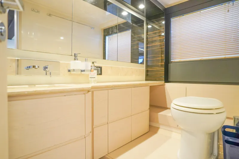 Slide: The Image of Luxurious bathroom in 2017 Azimut 66 Flybridge yacht with modern fixtures and elegant design. - 47