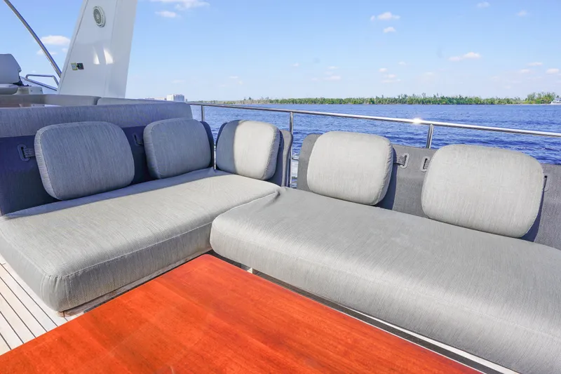 Slide: The Image of Luxurious seating on 2017 Azimut 66 Flybridge yacht with scenic water view. - 50