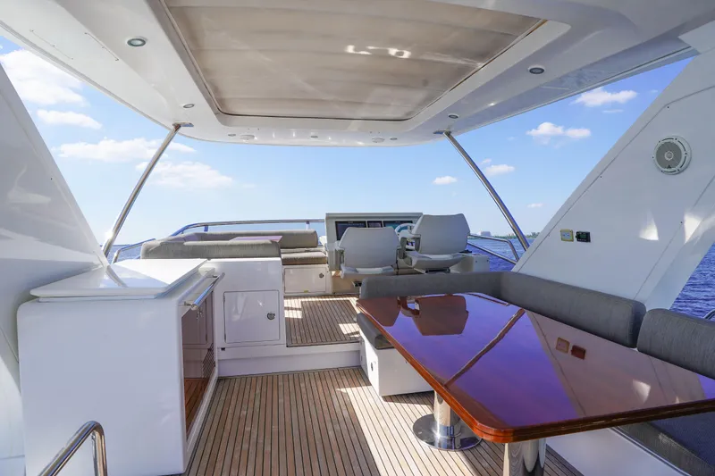Slide: The Image of Luxurious 2017 Azimut 66 Flybridge yacht interior with elegant seating and ocean view. - 51