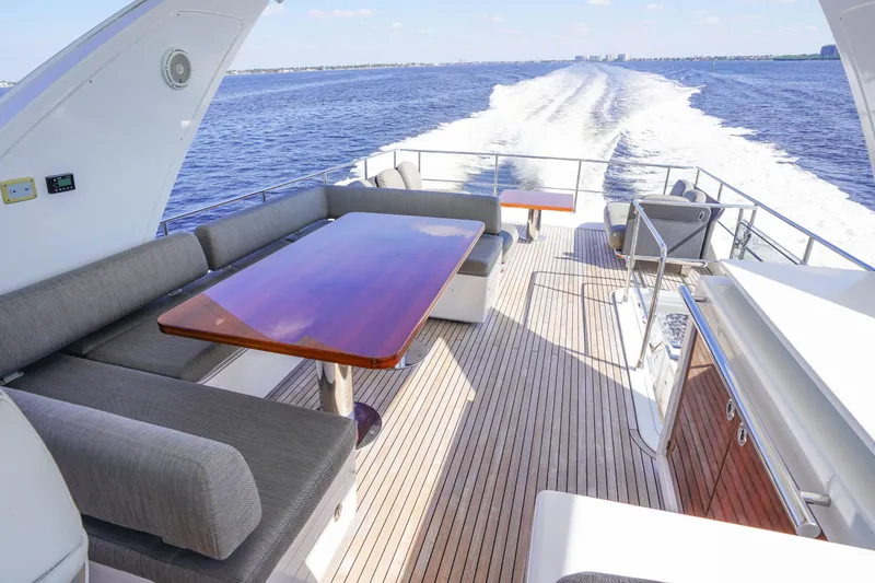 Slide: The Image of Luxurious 2017 Azimut 66 Flybridge yacht with spacious deck and elegant seating. - 52