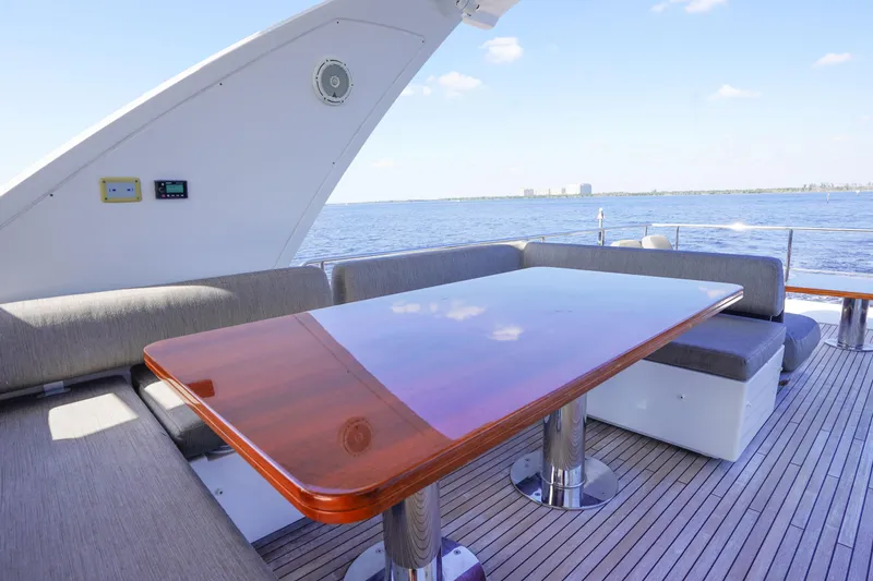 Slide: The Image of Luxurious 2017 Azimut 66 Flybridge yacht deck with elegant seating and ocean view. - 53