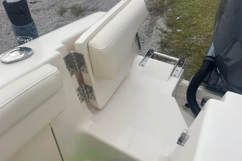 Slide: The Image of 2023 Grady-White Freedom 285 boat with foldable seat and stainless steel hinges. - 21