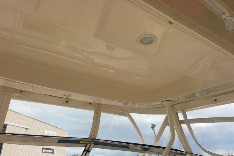 Slide: The Image of 2023 Grady-White Freedom 285 boat interior ceiling with lighting and support structures. - 34