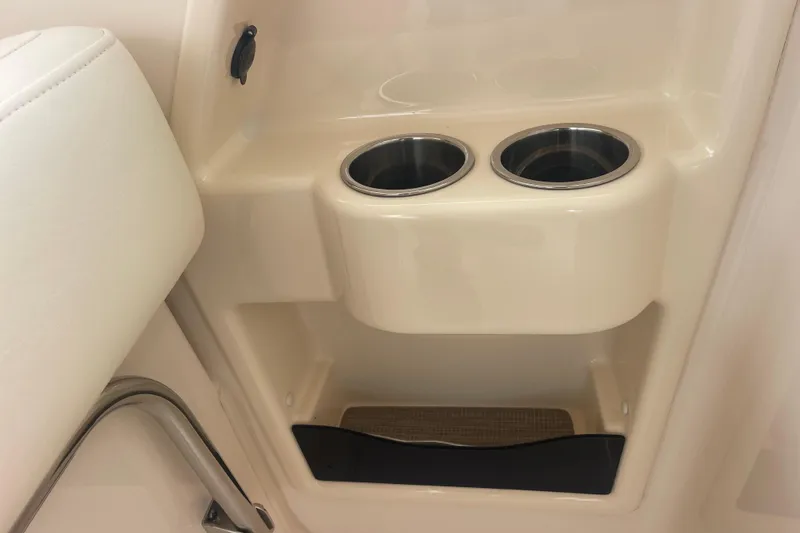 Slide: The Image of 2023 Grady-White Freedom 285 boat interior with dual cup holders. - 44