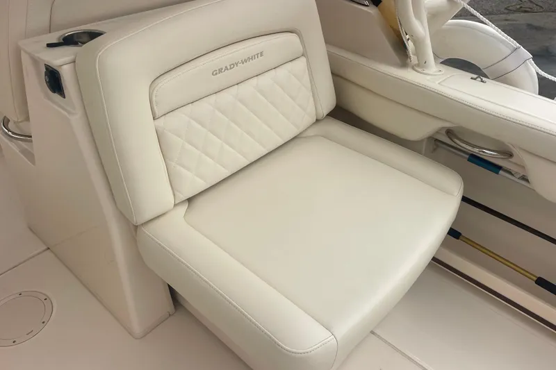Slide: The Image of 2023 Grady-White Freedom 285 boat seat with white leather upholstery and elegant design. - 45