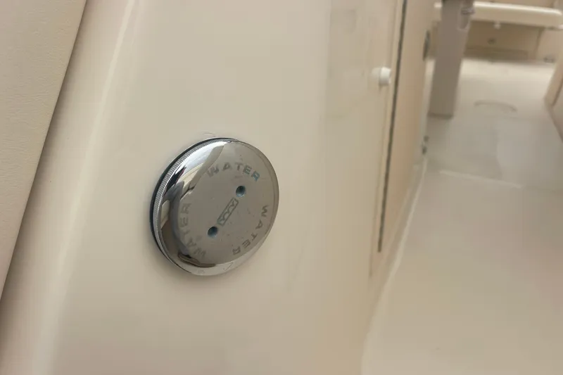 Slide: The Image of 2023 Grady-White Freedom 285 boat water fill cap on deck. - 55