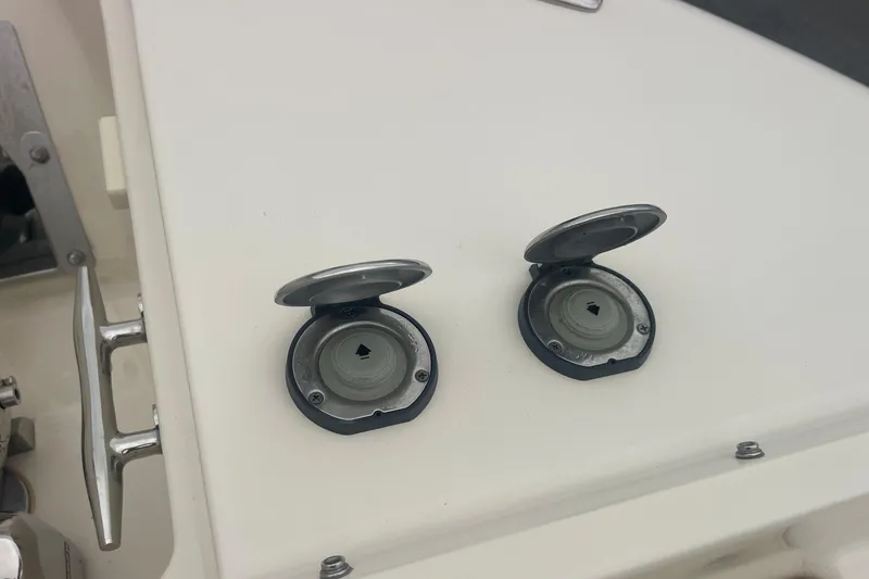 Slide: The Image of Fuel caps on 2023 Grady-White Freedom 285 boat deck. - 57