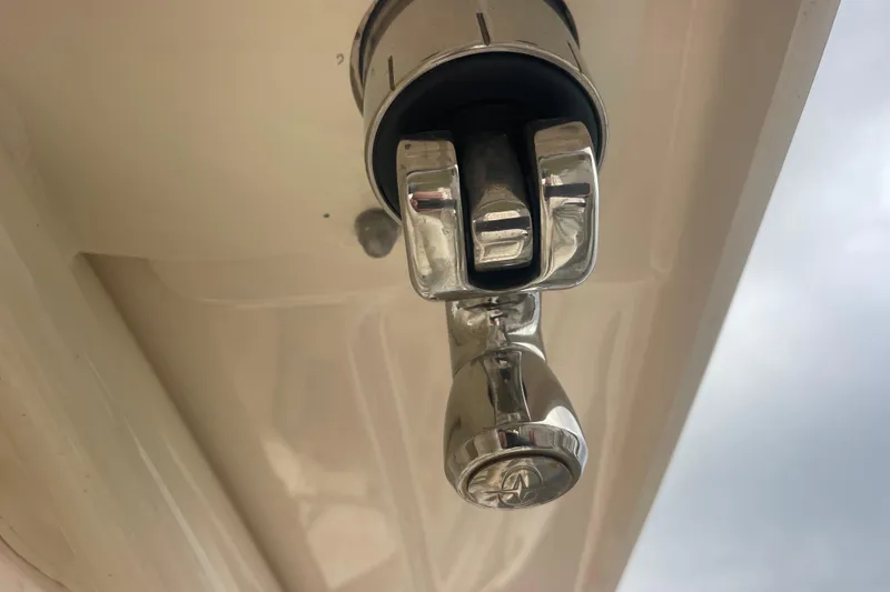 Slide: The Image of Close-up of a chrome fixture on a 2023 Grady-White Freedom 285 boat. - 58