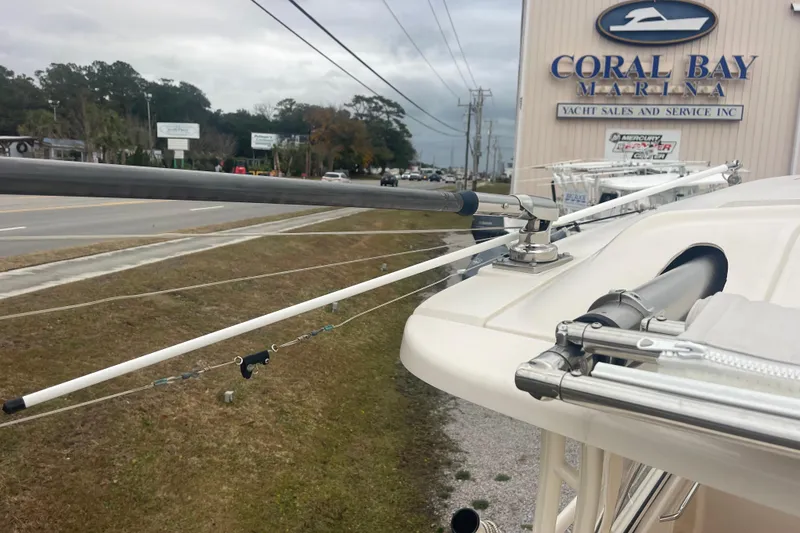 Slide: The Image of 2023 Grady-White Freedom 285 at Coral Bay Marina, showcasing fishing outriggers. - 60
