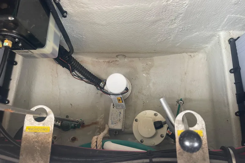 Slide: The Image of 2023 Grady-White Freedom 285 boat interior wiring and components. - 67