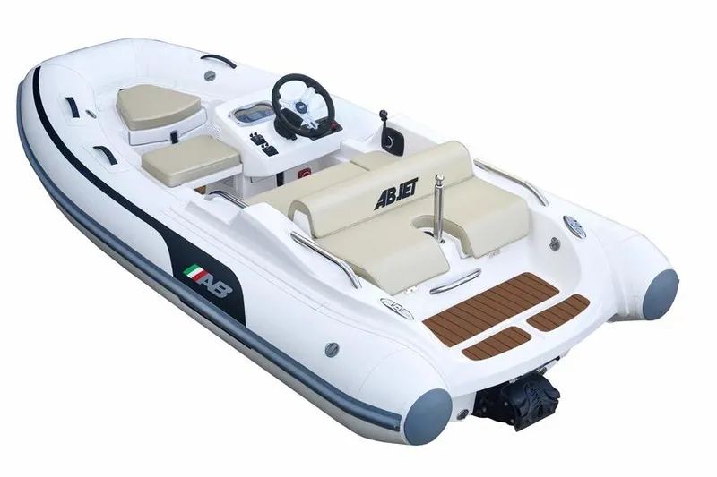 Slide: The Image of 2026 AB Inflatables ABJET 390XP, luxury inflatable boat with sleek design and beige seating. - 9