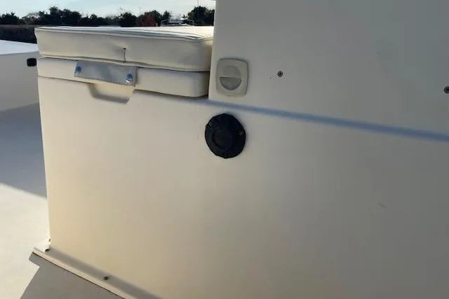 Slide: The Image of 2019 Jones Brothers 17 BATEAU boat interior with cushioned seating and control panel. - 6