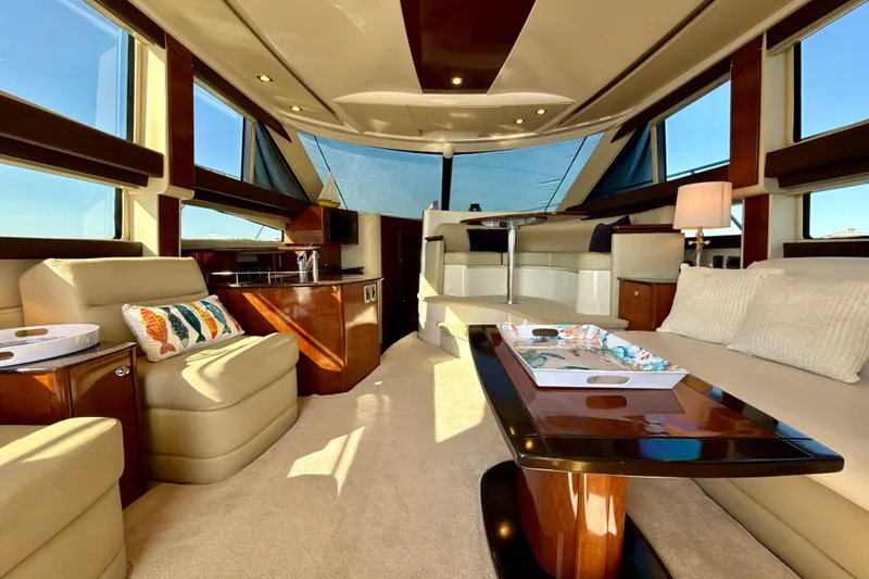 Slide: The Image of Luxurious interior of a 2009 Meridian 391 Sedan yacht with elegant seating and modern decor. - 24