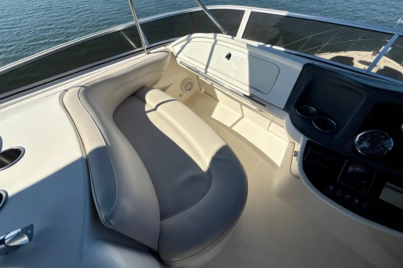 Slide: The Image of 2009 Meridian 391 Sedan boat interior with seating and control panel. - 46