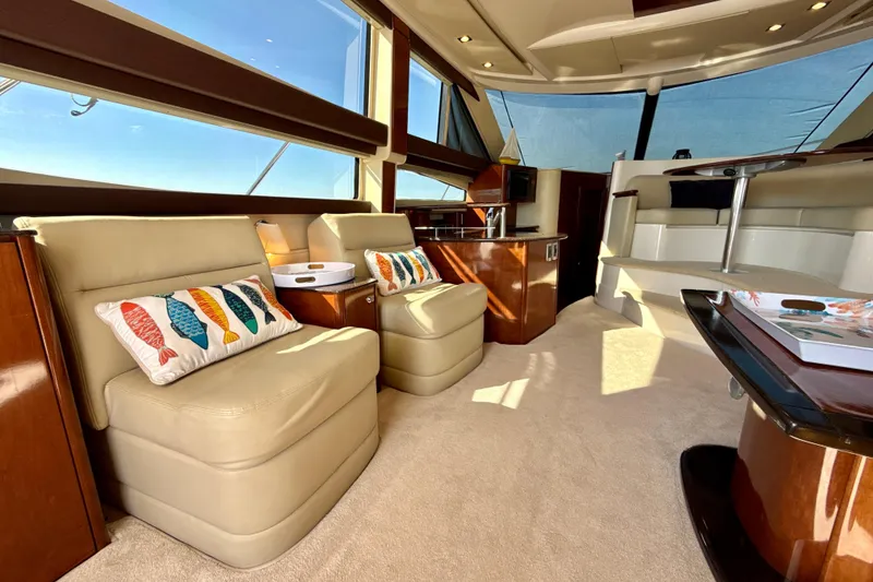 Slide: The Image of Luxurious interior of a 2009 Meridian 391 Sedan yacht with plush seating and elegant decor. - 5