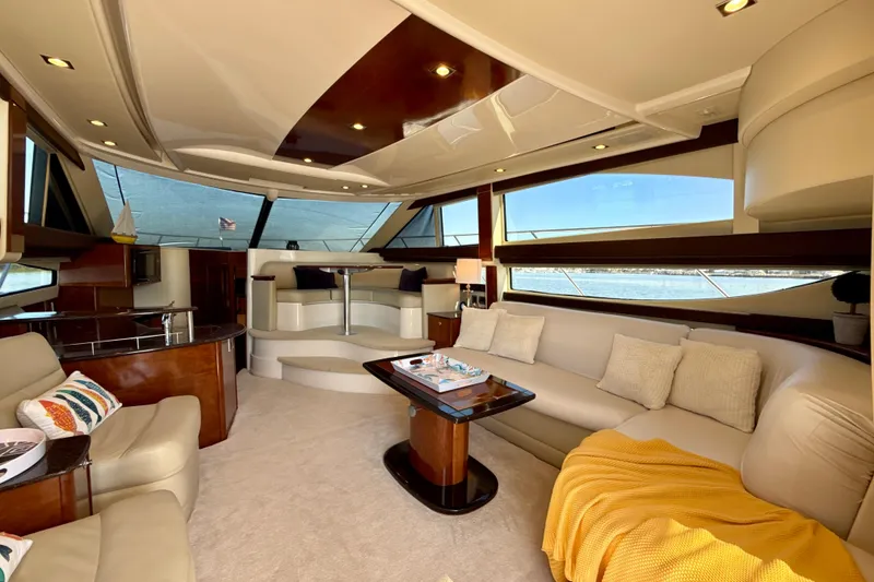 Slide: The Image of Luxurious interior of a 2009 Meridian 391 Sedan yacht with elegant seating and decor. - 6