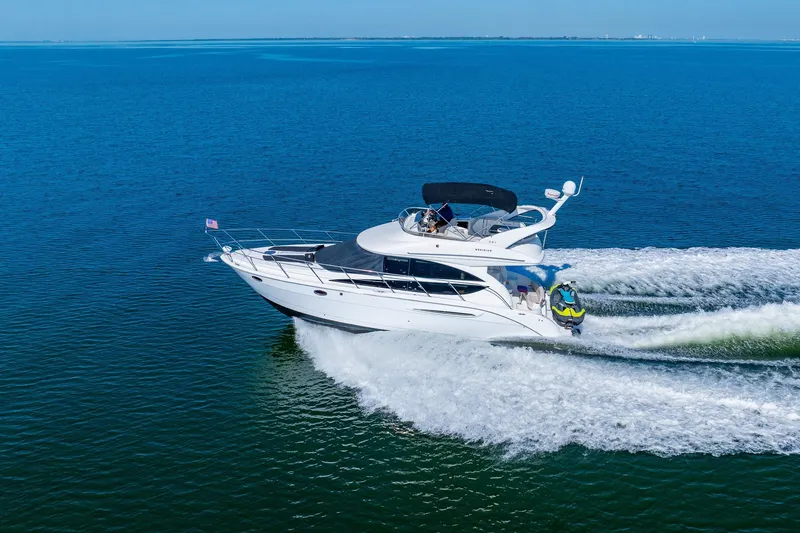 Slide: The Image of 2009 Meridian 391 Sedan cruising on open blue waters. - 60