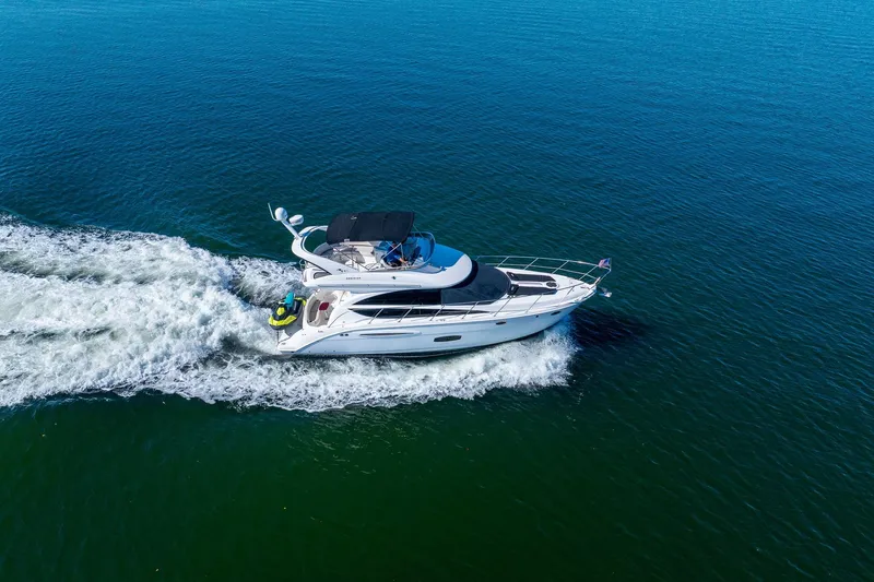 Slide: The Image of Aerial view of 2009 Meridian 391 Sedan yacht cruising on open water. - 63