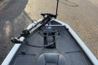 Slide: The Image of 2021 Tracker Pro Team 190 TX Tournament Edition boat deck with fishing equipment. - 9