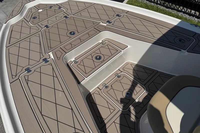 Slide: The Image of 2019 Key West 230 Bay Reef boat deck with tan non-slip surface. - 111