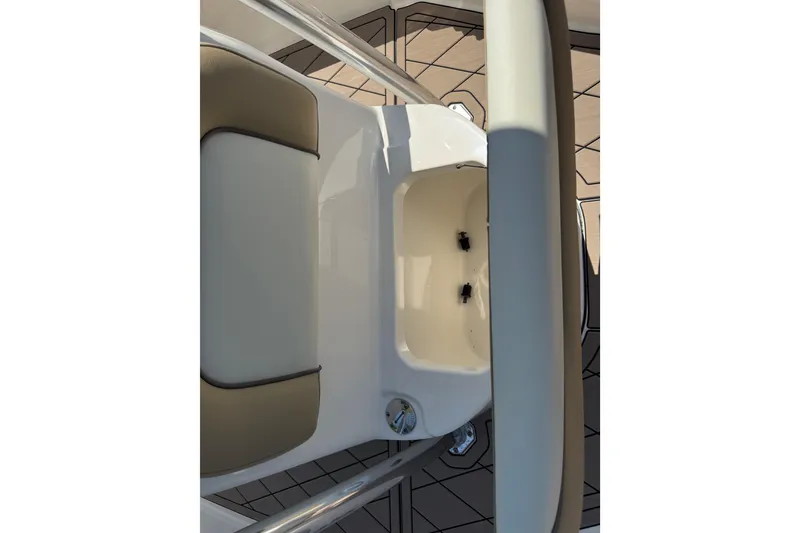 Slide: The Image of 2019 Key West 230 Bay Reef boat interior with seating and storage compartment. - 113