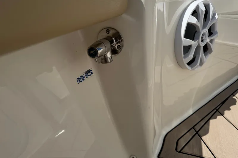Slide: The Image of Freshwater outlet and speaker on 2019 Key West 230 Bay Reef boat. - 116