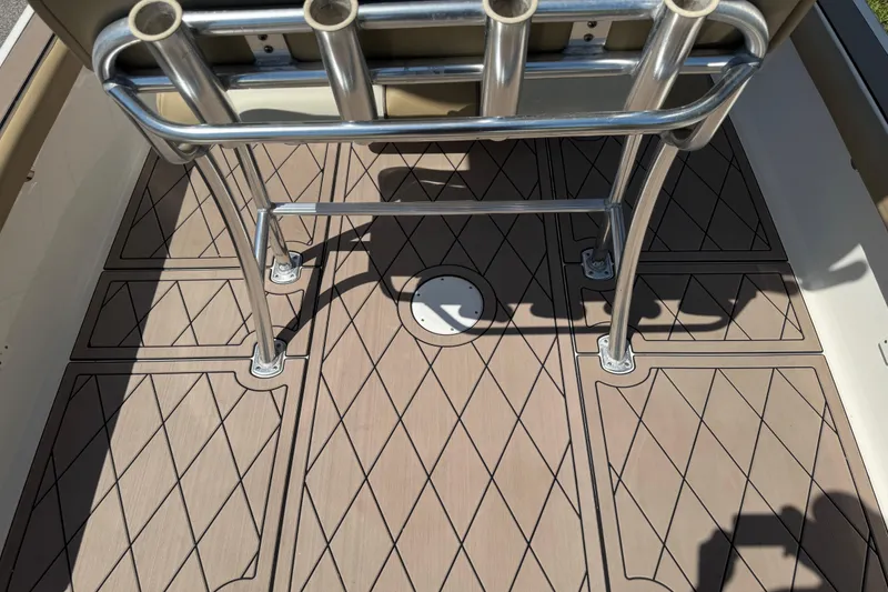 Slide: The Image of 2019 Key West 230 Bay Reef boat deck with stainless steel rod holders. - 119