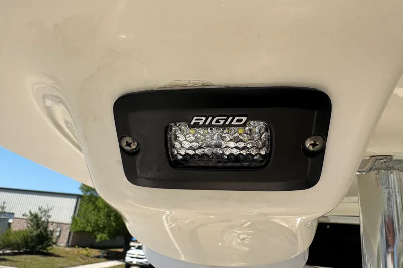 Slide: The Image of LED light on 2019 Key West 230 Bay Reef boat, featuring Rigid branding. - 123