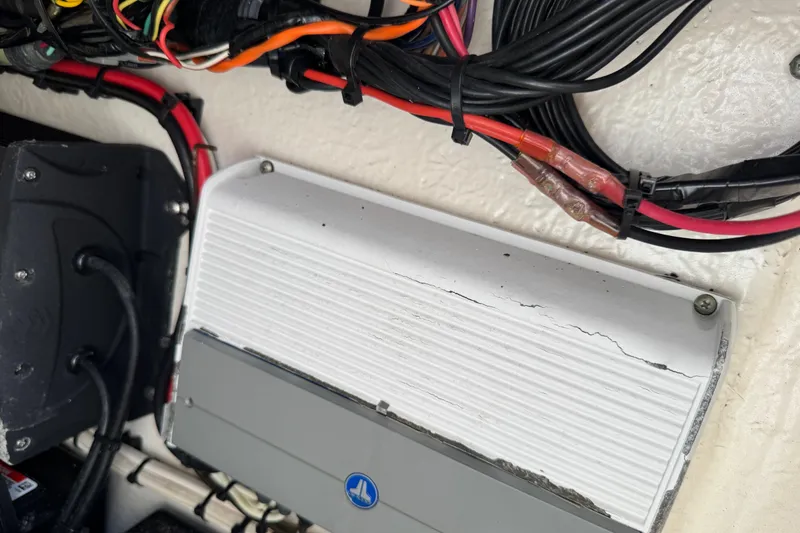 Slide: The Image of Electrical wiring and components inside a 2019 Key West 230 Bay Reef boat. - 129