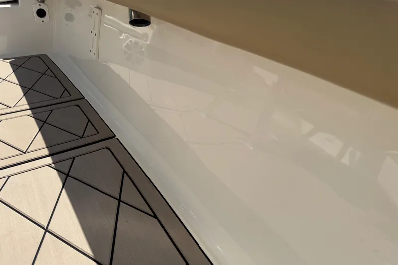 Slide: The Image of Interior view of 2019 Key West 230 Bay Reef boat with patterned flooring. - 134