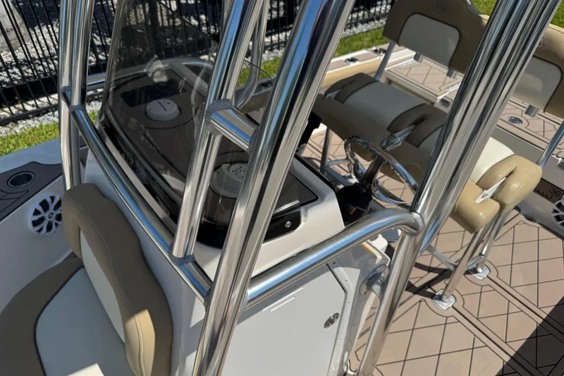 Slide: The Image of 2019 Key West 230 Bay Reef boat interior with steering console and seating. - 141