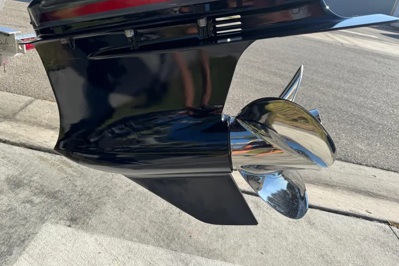 Slide: The Image of Close-up of a 2019 Key West 230 Bay Reef boat propeller on a sunny day. - 22