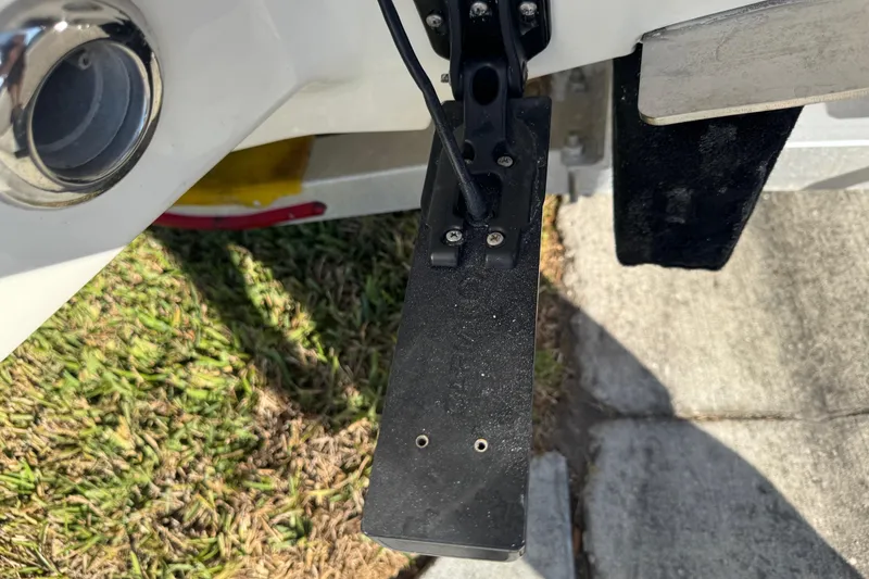 Slide: The Image of Transducer mounted on a 2019 Key West 230 Bay Reef boat, near grass and pavement. - 27