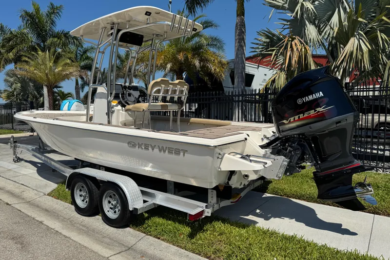 Slide: The Image of 2019 Key West 230 Bay Reef boat on trailer with Yamaha outboard motor. - 4