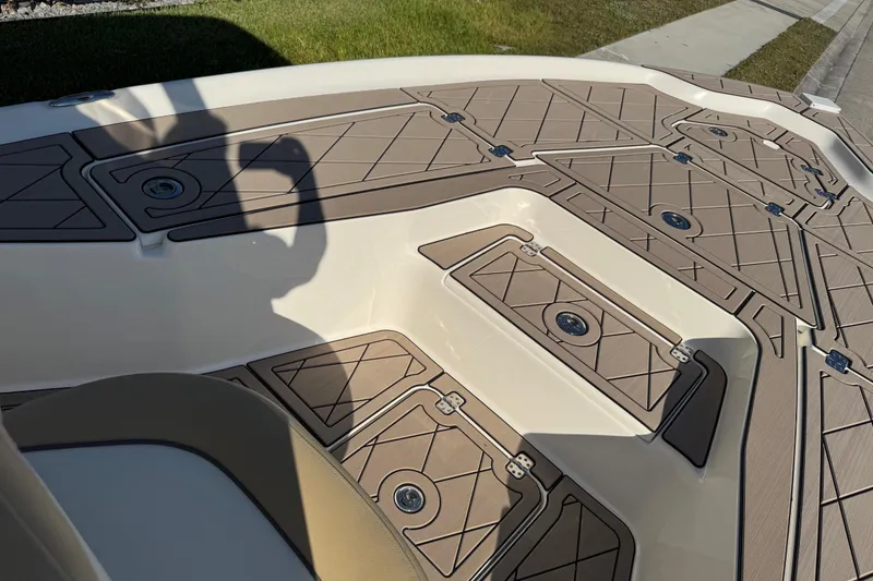 Slide: The Image of 2019 Key West 230 Bay Reef boat deck with tan non-slip surface. - 40