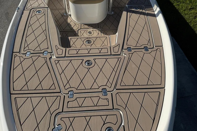 Slide: The Image of 2019 Key West 230 Bay Reef boat deck with diamond-patterned non-slip surface. - 41