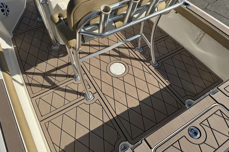 Slide: The Image of 2019 Key West 230 Bay Reef boat deck with diamond-patterned flooring and seating. - 51