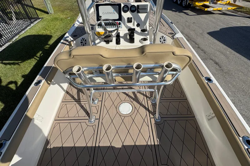 Slide: The Image of 2019 Key West 230 Bay Reef boat interior with Garmin system and rod holders. - 52