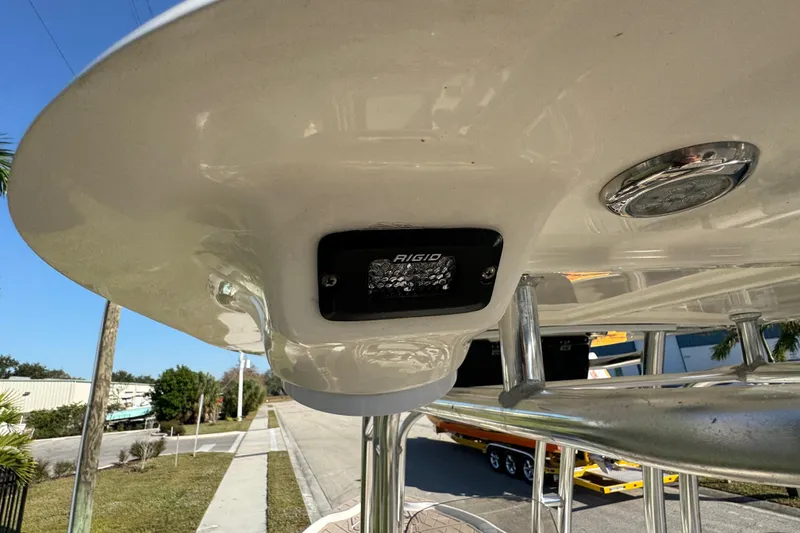 Slide: The Image of 2019 Key West 230 Bay Reef boat with mounted Rigid LED light. - 55