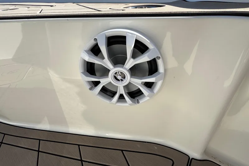 Slide: The Image of Speaker on 2019 Key West 230 Bay Reef boat, mounted on white surface. - 59