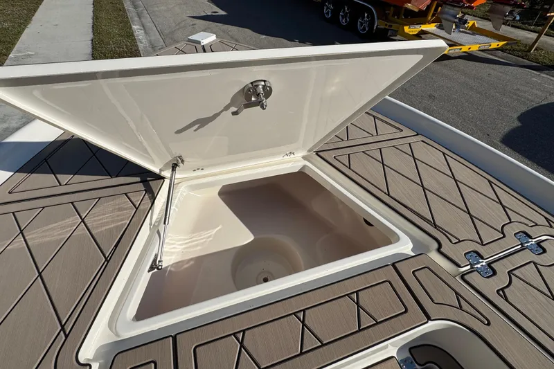 Slide: The Image of Open storage compartment on 2019 Key West 230 Bay Reef boat deck. - 66