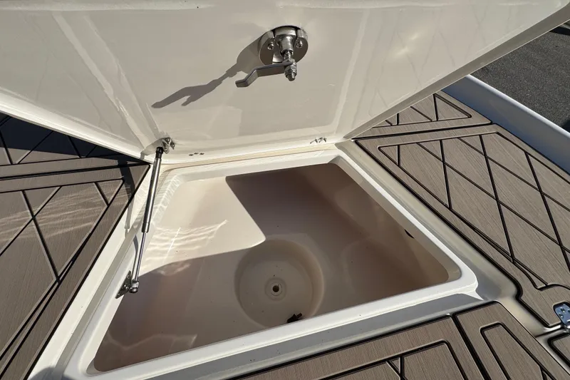 Slide: The Image of Open storage compartment on 2019 Key West 230 Bay Reef boat deck. - 67