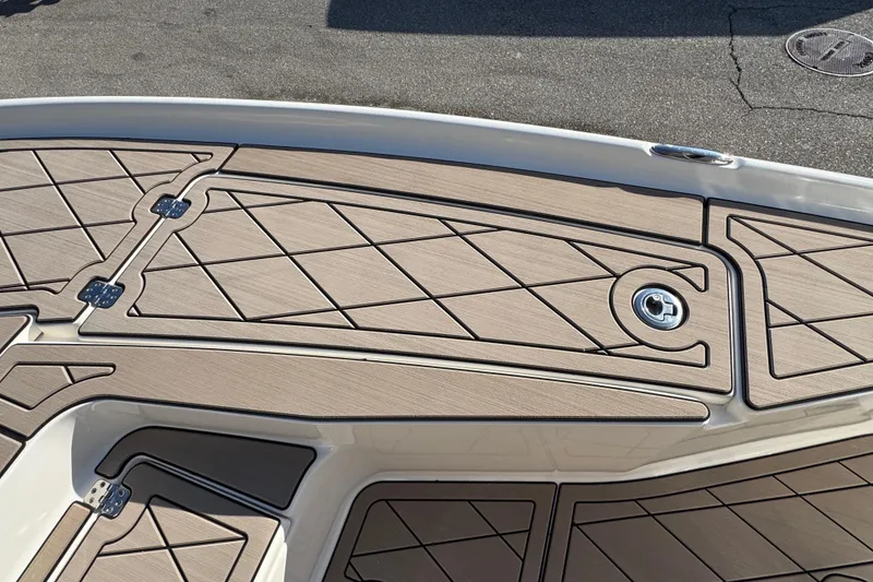 Slide: The Image of 2019 Key West 230 Bay Reef boat deck with sleek, modern design and secure storage compartments. - 70