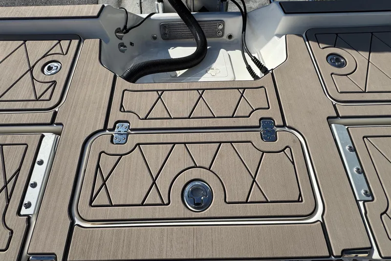 Slide: The Image of 2019 Key West 230 Bay Reef boat deck with textured, patterned flooring. - 79