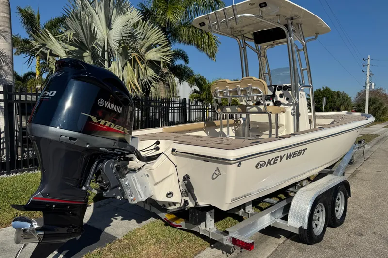 Slide: The Image of 2019 Key West 230 Bay Reef boat with Yamaha VMAX engine on trailer. - 8