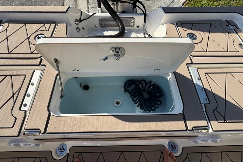 Slide: The Image of Open storage compartment on 2019 Key West 230 Bay Reef boat deck. - 80