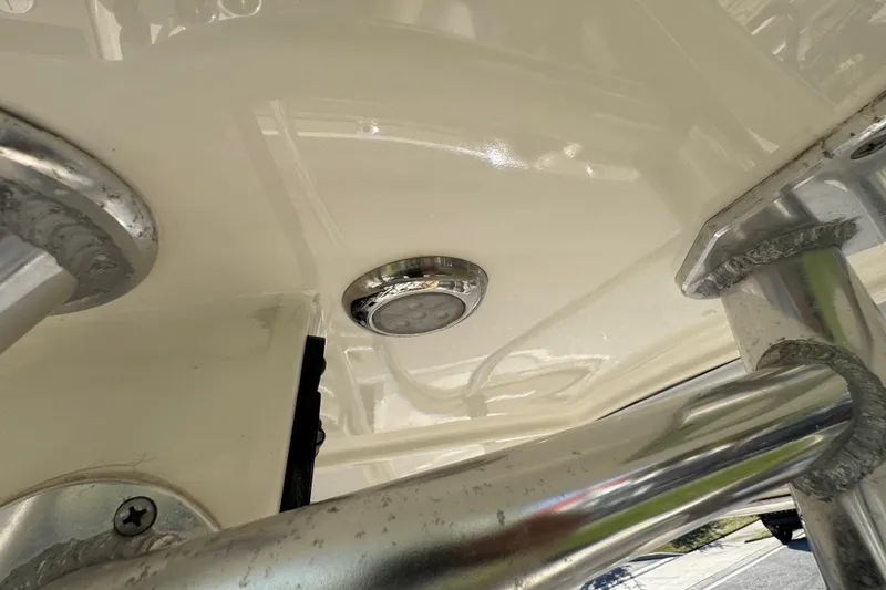 Slide: The Image of Close-up of 2019 Key West 230 Bay Reef boat's underside with metal fittings. - 98