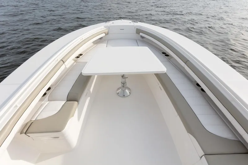 Slide: The Image of 2019 Regulator 34SS boat controls featuring Yamaha joystick and throttle system. - 15