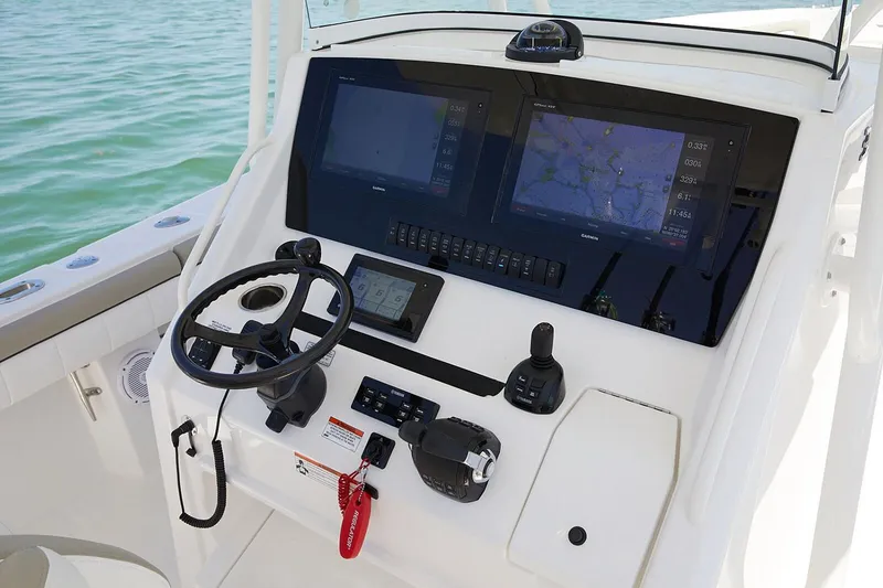 Slide: The Image of 2019 Regulator 34SS boat interior with open storage and sink. - 18